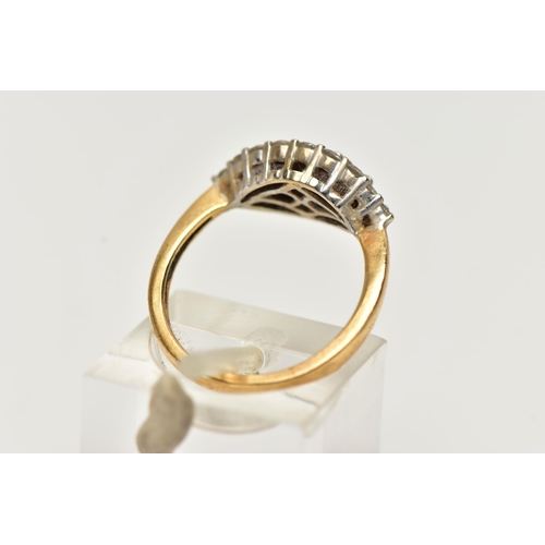 22 - AN 18CT GOLD DIAMOND CLUSTER RING, a navette shaped cluster ring comprised of nineteen round brillia... 