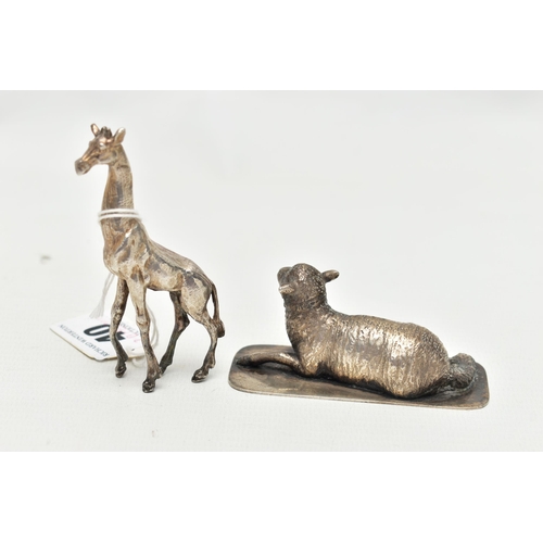 40 - TWO WHITE METAL FIGURES, to include a silver giraff, import marks for London, 1974, approximate leng... 