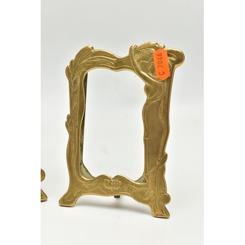 54 - TWO EARLY 20TH CENTURY BRASS FRAMES, art nouveau design brass frames, the first approximate height 2... 