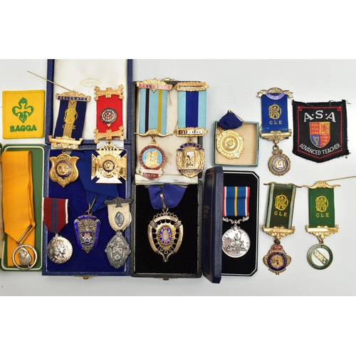 62 - A BOX OF ASSORTED MEDALS, to include two boxed silver and enamel medals for The Swimming Teachers A... 