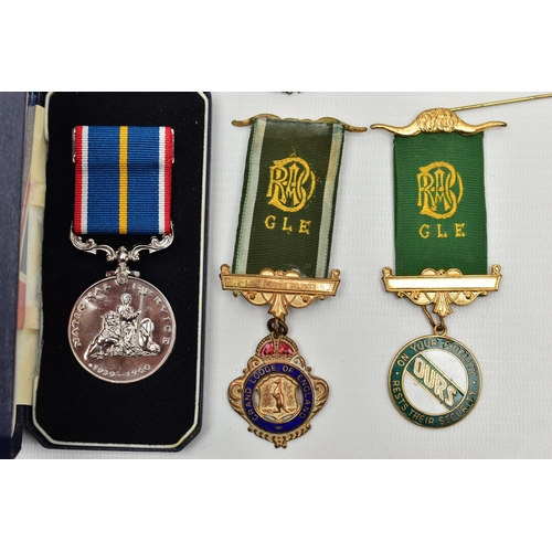 62 - A BOX OF ASSORTED MEDALS, to include two boxed silver and enamel medals for The Swimming Teachers A... 