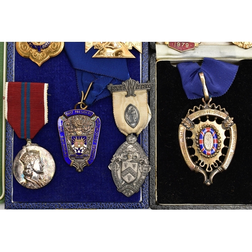 62 - A BOX OF ASSORTED MEDALS, to include two boxed silver and enamel medals for The Swimming Teachers A... 