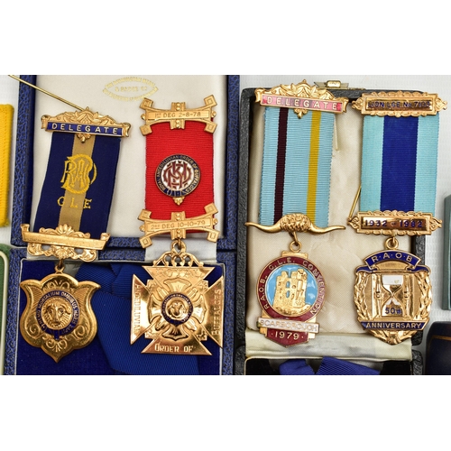 62 - A BOX OF ASSORTED MEDALS, to include two boxed silver and enamel medals for The Swimming Teachers A... 