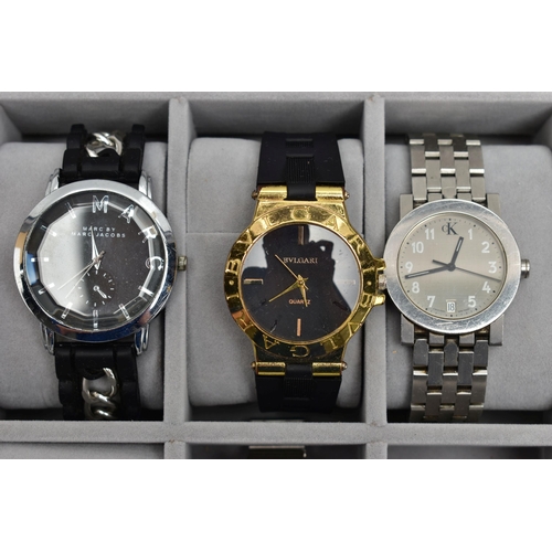 66 - A LARGE WATCH DISPLAY CASE WITH WATCHES, faux black leather case with Perspex lid, push release clas... 