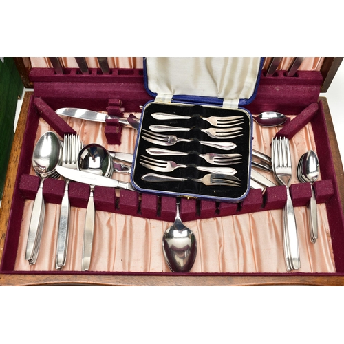 73 - A BOX OF ASSORTED CUTLERY, a large assortment of cutlery, an incomplete wooden canteen, a tray, a co... 