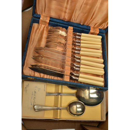 73 - A BOX OF ASSORTED CUTLERY, a large assortment of cutlery, an incomplete wooden canteen, a tray, a co... 