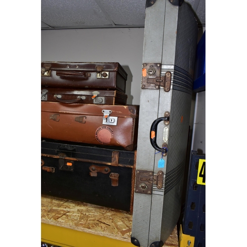 321 - TEN VINTAGE SUITCASES, in various styles, sizes and materials, to include three non-matching Crown s... 