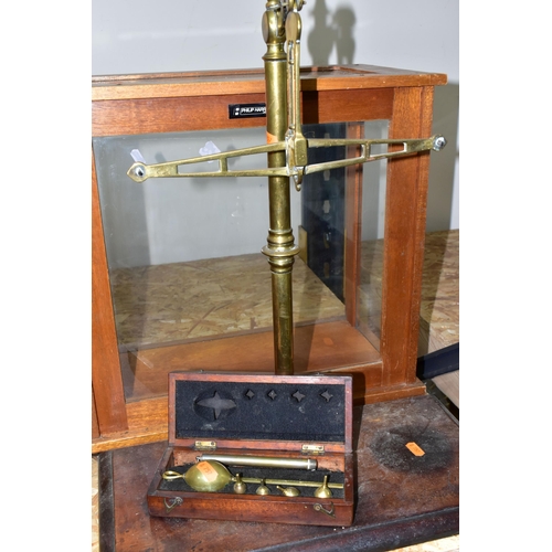 333 - A GROUP OF BALANCE SCALES AND EMPTY GLASS CASES, comprising a wooden cased saccharometer No. 4073 by... 