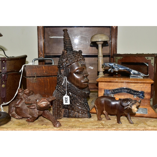 334 - A COLLECTION OF TREEN AND CARVED WOOD,  comprising an African Art tribal bust of a female, two water... 