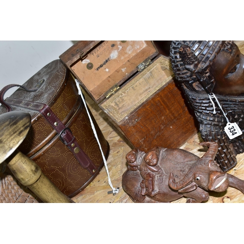 334 - A COLLECTION OF TREEN AND CARVED WOOD,  comprising an African Art tribal bust of a female, two water... 