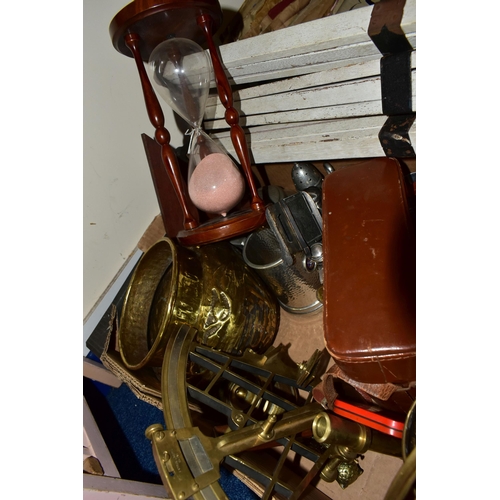 343 - TWO BOXES OF METALWARE AND SUNDRIES, to include a collection of vintage corkscrews and nut crackers,... 