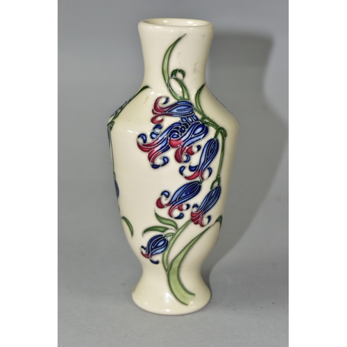 371 - A MOORCROFT POTTERY BLUEBELL HARMONY VASE, the footed vase decorated in the Bluebell Harmony pattern... 