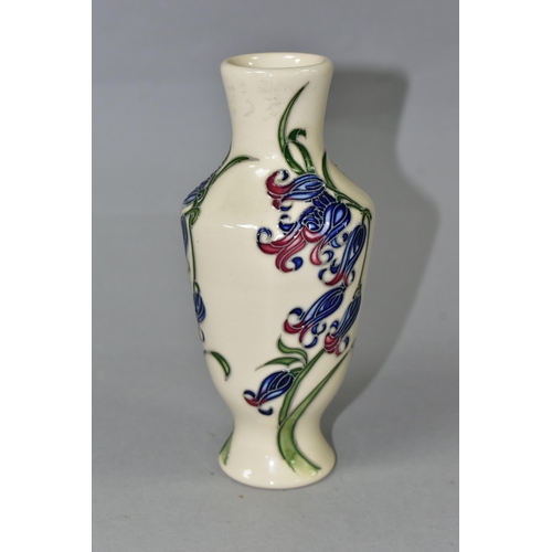 371 - A MOORCROFT POTTERY BLUEBELL HARMONY VASE, the footed vase decorated in the Bluebell Harmony pattern... 