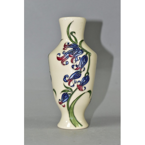 371 - A MOORCROFT POTTERY BLUEBELL HARMONY VASE, the footed vase decorated in the Bluebell Harmony pattern... 