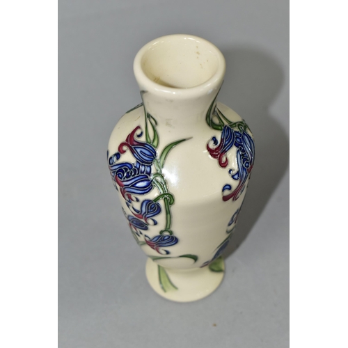 371 - A MOORCROFT POTTERY BLUEBELL HARMONY VASE, the footed vase decorated in the Bluebell Harmony pattern... 