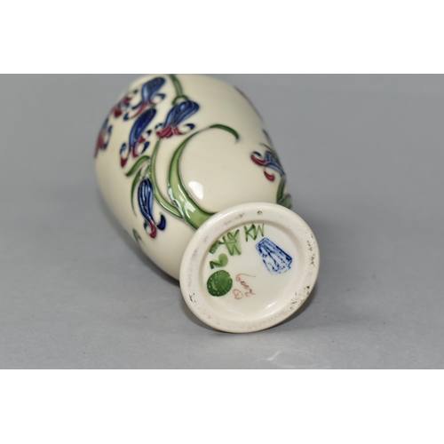 371 - A MOORCROFT POTTERY BLUEBELL HARMONY VASE, the footed vase decorated in the Bluebell Harmony pattern... 