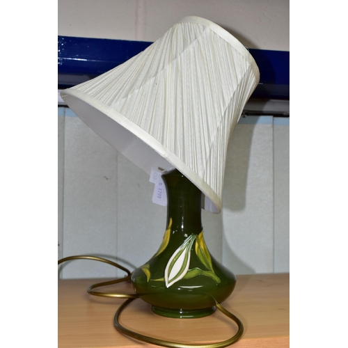 379 - A MOORCROFT POTTERY BERMUDA LILY TABLE LAMP, of compressed baluster form, tube lined with white lily... 