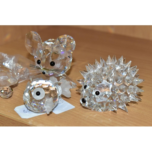 388 - FOUR SWAROVSKI ANIMAL FIGURES, comprising 'Puffer Fish', 'Mouse' (missing tail), 'Turtle' and 'Hedge... 