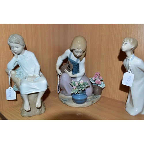 391 - FOUR LLADRO FIGURES, comprising 'Flower Song', a Lladro Museum Collectors Society 1988 figure, heigh... 