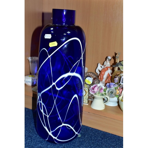 404 - A COLLECTION OF CERAMICS AND COLOURED GLASS, comprising a large  blue glass vase with applied white ... 