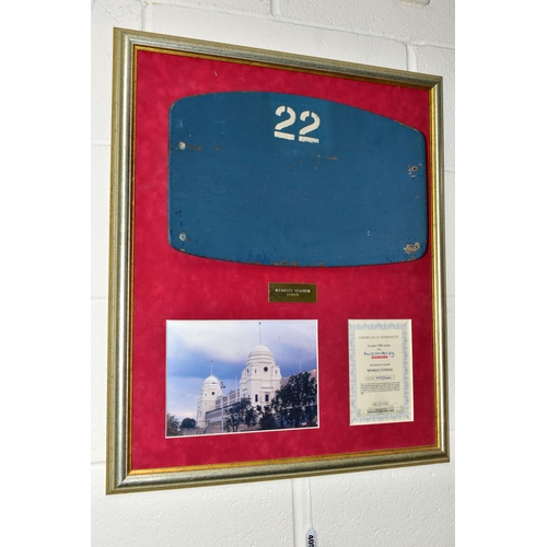 405 - A WEMBLEY STADIUM SEAT, mounted on a frame with a photograph of the old Wembley Stadium, this seat i... 