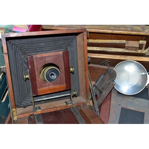 421 - AN EARLY 20TH CENTURY WOODEN GRAMOPHONE AND A WOODEN CASE OF PHOTOGRAPHIC EQUIPMENT, together with a... 