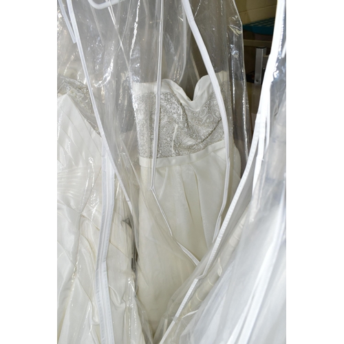 278 - FIFTEEN WEDDING DRESSES, retail stock clearance (some may have marks or very light damage) varying i... 