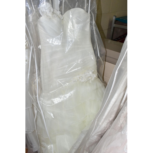 278 - FIFTEEN WEDDING DRESSES, retail stock clearance (some may have marks or very light damage) varying i... 