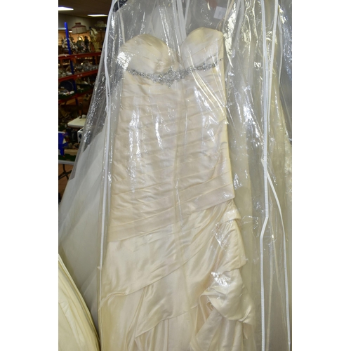 280 - TWENTY WEDDING DRESSES, retail stock clearance (may have marks and minor damage) varying in styles a... 