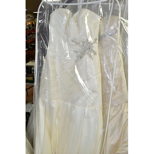 280 - TWENTY WEDDING DRESSES, retail stock clearance (may have marks and minor damage) varying in styles a... 