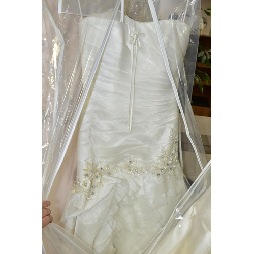 280 - TWENTY WEDDING DRESSES, retail stock clearance (may have marks and minor damage) varying in styles a... 