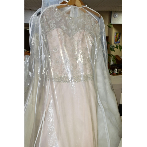 280 - TWENTY WEDDING DRESSES, retail stock clearance (may have marks and minor damage) varying in styles a... 