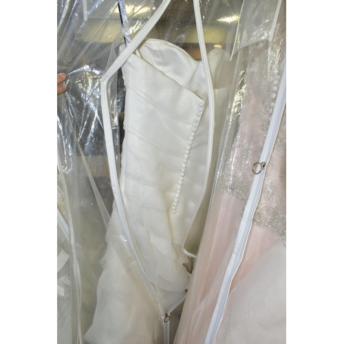 280 - TWENTY WEDDING DRESSES, retail stock clearance (may have marks and minor damage) varying in styles a... 