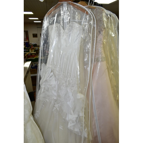 280 - TWENTY WEDDING DRESSES, retail stock clearance (may have marks and minor damage) varying in styles a... 