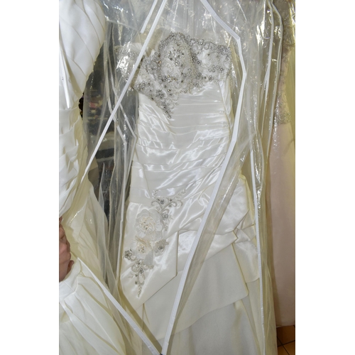 280 - TWENTY WEDDING DRESSES, retail stock clearance (may have marks and minor damage) varying in styles a... 