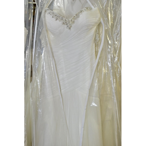 280 - TWENTY WEDDING DRESSES, retail stock clearance (may have marks and minor damage) varying in styles a... 