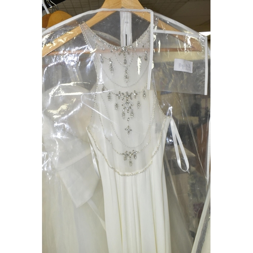 280 - TWENTY WEDDING DRESSES, retail stock clearance (may have marks and minor damage) varying in styles a... 