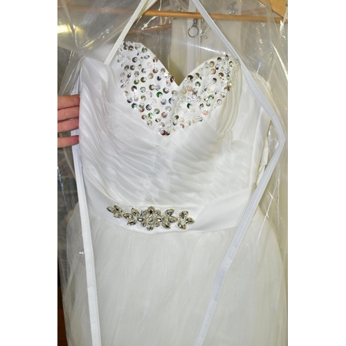 280 - TWENTY WEDDING DRESSES, retail stock clearance (may have marks and minor damage) varying in styles a... 