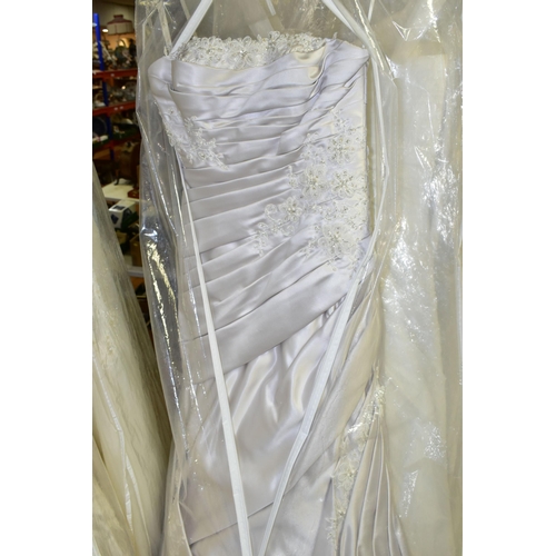 280 - TWENTY WEDDING DRESSES, retail stock clearance (may have marks and minor damage) varying in styles a... 