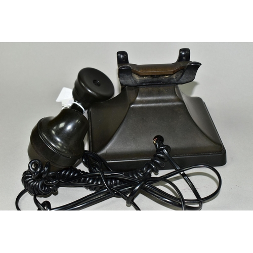 442 - A BROWN BAKELITE TELEPHONE WITH DRAWER, recessed marks to the handset - 164 56, stencil marks to the... 