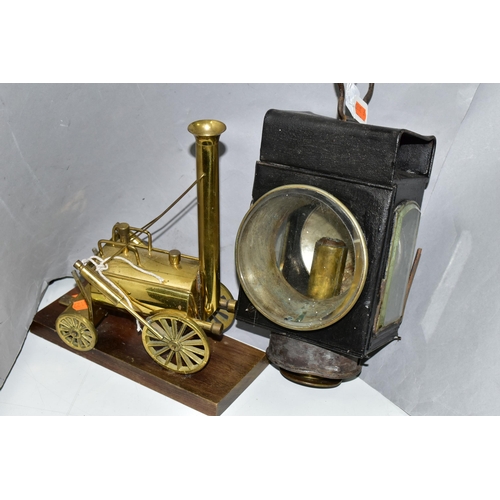 444 - A CANDLE POWERED RAILWAY? LAMP TOGETHER WITH A BRASS MODEL OF STEPHENSON'S ROCKET