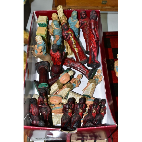 446 - THREE MODERN CHESS SETS, comprising a Chinese travel set in a carry case, a full size Chinese set in... 