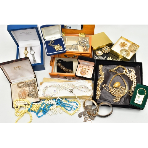 65 - A SELECTION OF SILVER AND COSTUME JEWELLERY, to include a silver hinged bangle, decorated with a flo... 