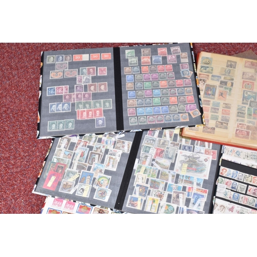 17 - RED TUB WITH TWELVE ALBUMS OF WORLDWIDE STAMPS, we note duplicated USA 19C used, Mid period Germany,... 