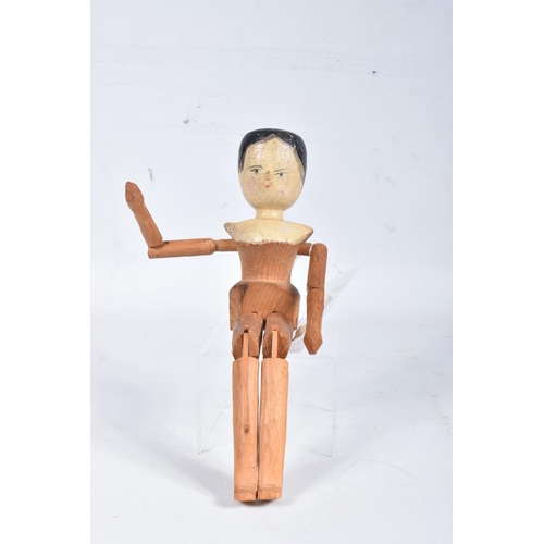 79 - TWO DUTCH WOODEN PEG DOLLS, c.19th Century, both with painted head and shoulders and unpainted joint... 