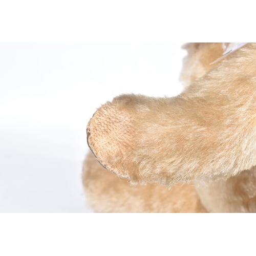 80 - A CHAD VALLEY BLONDE MOHAIR TEDDY BEAR, amber and black glass eyes, shaved muzzle, vertical stitched... 