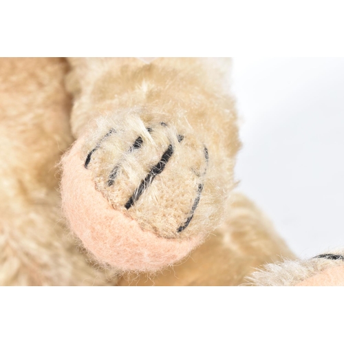 80 - A CHAD VALLEY BLONDE MOHAIR TEDDY BEAR, amber and black glass eyes, shaved muzzle, vertical stitched... 