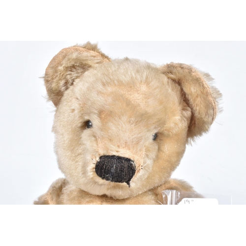 80 - A CHAD VALLEY BLONDE MOHAIR TEDDY BEAR, amber and black glass eyes, shaved muzzle, vertical stitched... 