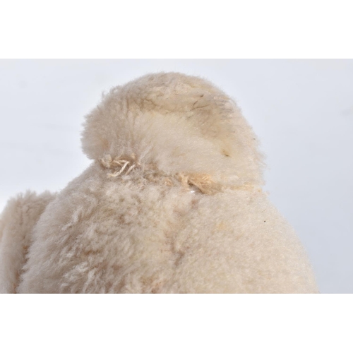 86 - A FARNELL ALPHA TYPE WHITE MOHAIR TEDDY BEAR, c.1930's, original amber and black glass eyes, horizon... 