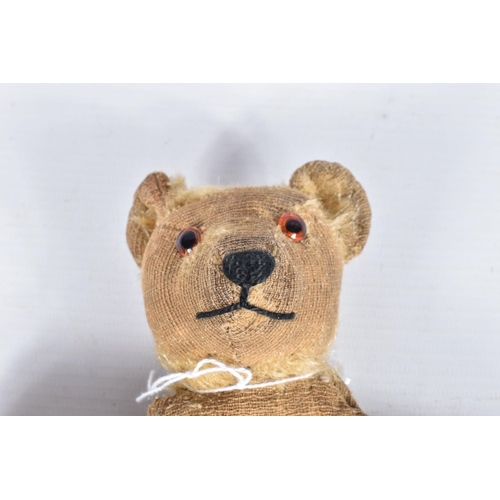 87 - A GERMAN BLONDE MOHAIR TEDDY BEAR, c.1914 - 1920, original glued amber and black glass eyes (both wi... 